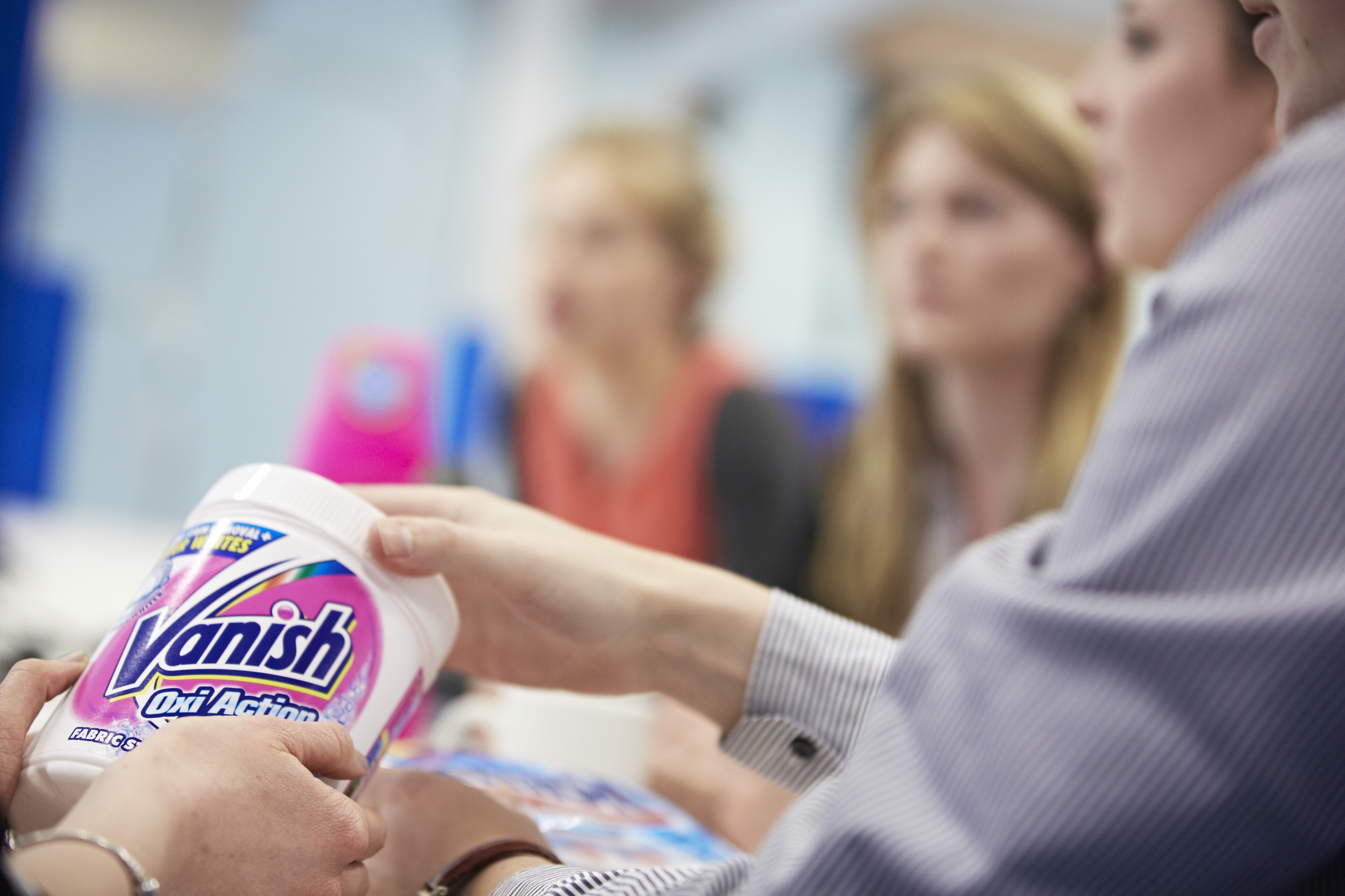 White vanish tub is passed around a table 