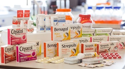 Collection of different types of Strepsil boxes, packets and tubs