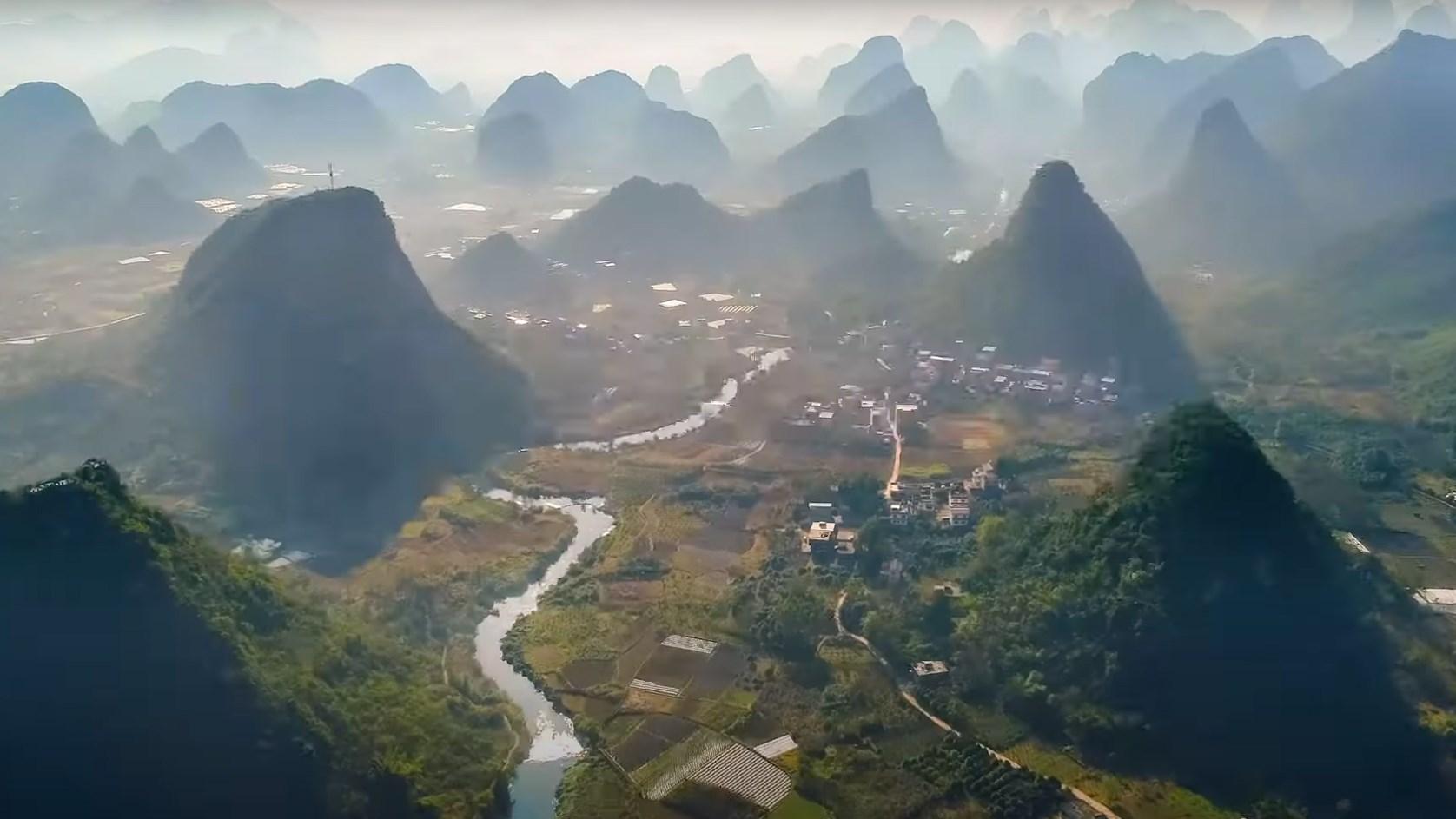 A lake running through hills and mountains.