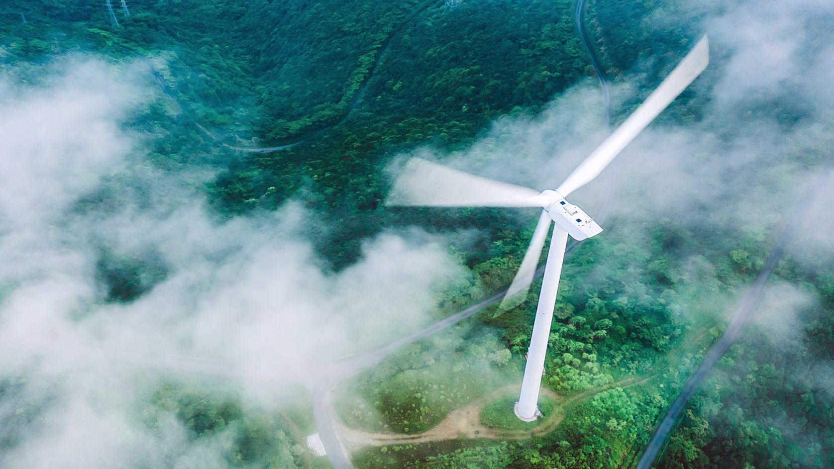 Aerial view of wind turbine and clouds