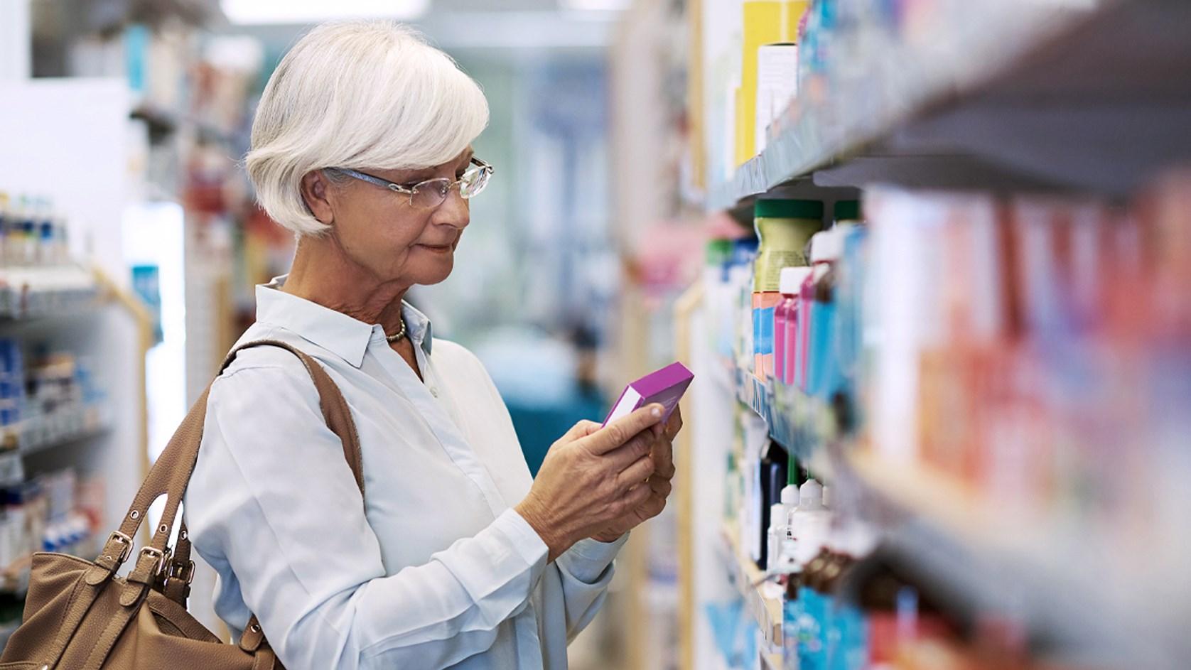 Elderly Woman Looking At A Product RT Cropped 1676X943