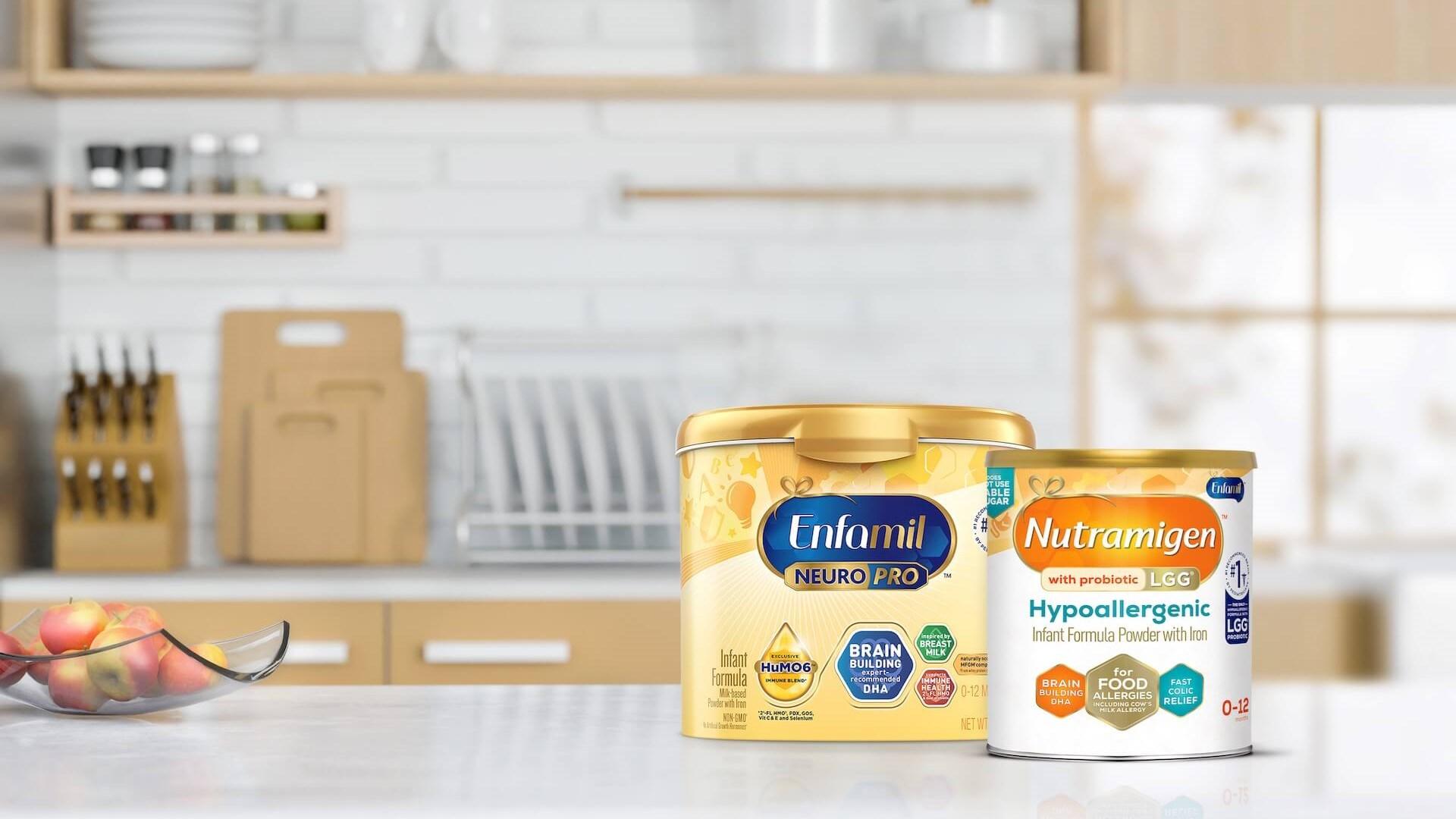 An Enfamil and Nutrimigen product sitting on a kitchen bench