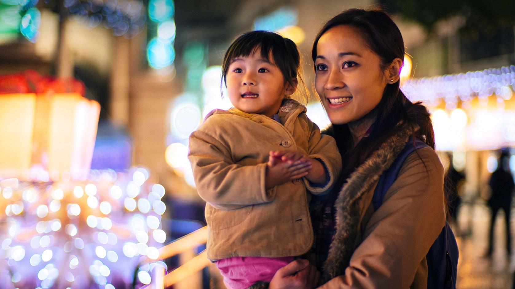 Woman holding child